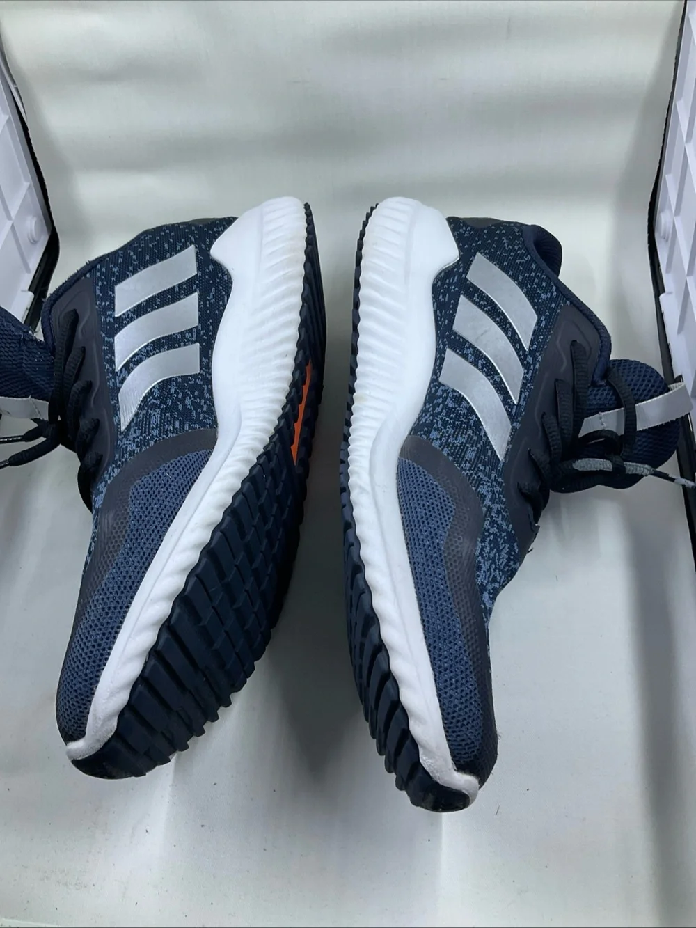 adidas Men's Navy Blue Athletic Shoes with Silver Stripes and Orange Accent